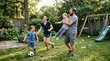 © Pris - Joyful family playing soccer and having fun in their backyard on a sunny day