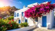 © Parjinah - Whitewashed Greek house with blue doors.