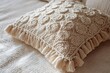 © sayan - coastal macrame cushion cover with seashell pattern details