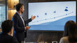 © Preeyanuch - Business growth roadmap slide presentation in office meeting room with professional team watching screen