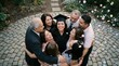 © Konstiantyn Zap - Graduate surrounded by family celebrating with confetti on cobblestone courtyard for graduation celebration and achievement background