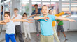 © JackF - Dance class for kids, positive girls and boys training in dance studio