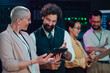 © Zamrznuti tonovi - It engineers and technicians connecting in a server room, using a digital tablet for data analysis and system maintenance