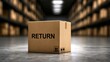 © ShahinAlam - Cardboard box with RETURN label in a warehouse storage facility