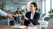 © aragiku - Businesswoman refusing a gift box in the office, representing corporate compliance and anti corruption ethics