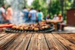 © oksa_studio - Table surface of wood with blurred background of people at a summer barbecue party