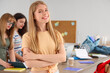 © Pixel-Shot - Female student studying in kitchen