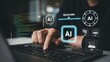 © jhgraphixion - Person using laptop with AI technology interface and futuristic digital graphics