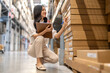 © Art_Photo - Inventory checklist, smiling asian woman using clipboard and pen for quality control, Product inspection, retail logistics, supply chain management, commercial business and merchandise distribution