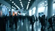 © Surachetsh - Blurred corporate event space with motion and crowd activity capturing a professional trade fair atmosphere with commerce and innovation theme.