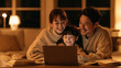 © Kowit - A smiling family of three using a laptop together in a cozy, warmly lit living room at night.