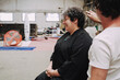 © Luciano Spinelli/Stocksy - Woman Smiles During Creative haircut Session