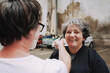 © Luciano Spinelli/Stocksy - POV portrait Haircut With a Smile
