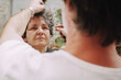 © Luciano Spinelli/Stocksy - POV barber Hair Styling Session