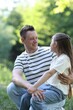 © New Africa - Smiling father and his daughter looking at each other outdoors