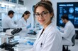 © Formoney - Young female scientist smiling while working in laboratory