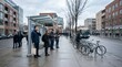 © starush - Neighborhood Transit Node With Bus Queue and Parked Bicycles