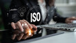 © InfiniteFlow - The concept of ISO certification for international quality management standards. A system for ensuring business process quality, efficiency, and compliance. Motif