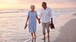 © Yuliya - Elderly couple walking hand in hand barefoot on beach at golden hour sunset, silver hair, linen clothing, footprints in wet sand, copy space. Generative AI
