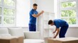 © BZXO - Professional moving crew protecting furniture with plastic wrap during a home move.