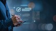 © Mayla - businessman manages files well using his laptop to choose the approve box for task management using a checklist and clipboard, a document management