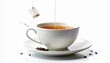 © coki - Tea being poured into a cup.