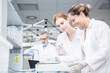 © Westend61 - Scientists weighing samples in rain lab