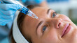 © Nataliya - Microneedling pen treatment on a forehead with a clear serum, advanced skincare and anti-aging treatment concept, defocused, with copy space