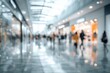 © Rajul - A blurred, ethereal view of a bustling shopping mall interior, showcasing a sense of movement and indistinct activity.
