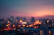 © Nurul - A blurred cityscape glows with warm light against a vibrant sunset sky, creating an abstract and atmospheric visual.