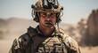 © Margarita Ratatosk - Soldier wearing tactical helmet with night vision goggles and communication headset. Portrait of a serious man in camouflage combat gear during a military deployment in open desert terrain.