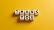 © mcjanuald - Client Appreciation Concept: Stacked typography blocks spelling thank you on vibrant yellow background for business communication