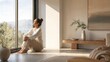 © PoyTumStudio - Woman relaxing by window in modern living room enjoying natural light and peaceful atmosphere
