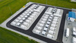 © Dark Artistic - Battery energy storage commercial facility, storing energy in modular containers for sustainable renewable electricity grid stabilization and power management