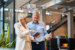 © Westend61 - Business collaboration in modern office during meeting and discussion