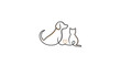 © kuah - A dog and a cat sitting together.