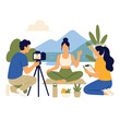 © sitiainab - Group of people filming a yoga instructor for an online video tutorial.