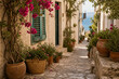 © ronnybas - Quiet generic Mediterranean coastal village alley with flowers