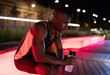 © Niyaz Tavkaev/Stocksy - Exhausted African American athlete drinking water