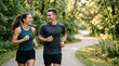 © Eve - Happy couple running in summer park together smiling. Young active man and woman jogging outdoors on path, lifestyle cardio workout, fitness training and healthy commercial concept.