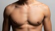 © pradana - Close-up of a fit man's bare chest and shoulders