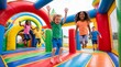 © Eka - Happy Diverse Children Having Fun Jumping Inside a Colorful Inflatable Bounce House at an Outdoor Playground