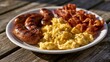 © Khawla - Hearty Breakfast Plate with Sausages Scrambled Eggs and Bacon in Warm Morning Sunlight