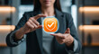 © Alexandr Peers - Secure identity approval in a woman hand highlights shield checkmark for account safety, password protection, insurance claim review and trusted access confirmation in online service process
