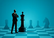© rudall30 - Business Strategy Concept, Strategic Leadership and Corporate Planning, Executive Standing Beside Chess King Piece Illustration