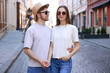 © New Africa - Lovely couple in sunglasses on city street