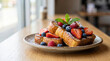 © Rasel - Delicious french toast with berries and maple syrup served on ceramic plate in warm sunlight at cozy breakfast cafe.