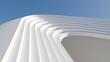 © ilham - Abstract 3D render of white curved geometric architectural lines against a clear blue sky. Minimalist modern building corner design