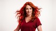 © Тоха Шикула - Confident young woman with flowing red hair in studio setting