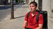 © Olga - Exhausted delivery courier sitting on a sidewalk, sweating and suffering from extreme heat during a severe European summer heatwave, urban climate change and gig-economy labor concept.